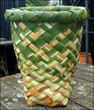 photo of a woven, shaped pot
