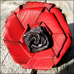 photo of a woven flax poppy