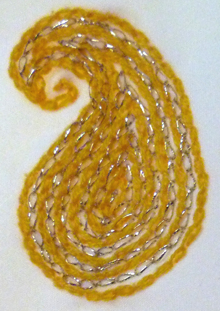 image of swirl detail on front of bodice of wedding dress