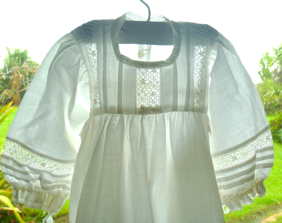 image of lace on baby gown