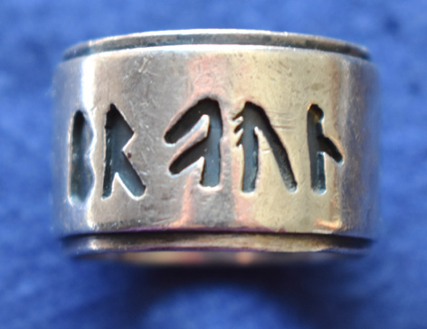image of silver ring runic writing overlay