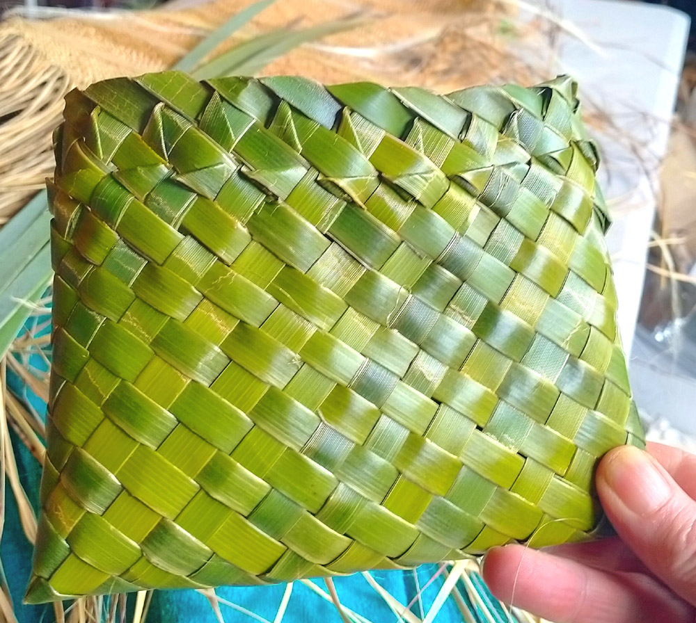 photo of flax basket with decorated top